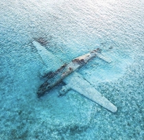 One of Pablo Escobars Drug Smuggling Planes That Missed the Runway and Crashed on a Sandbar in the Bahamas and Left Abandoned Since 