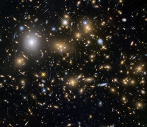 Over five billion light years away MACSJ is one of the largest and oldest galaxy clusters ever observed Image credit NASAHubble ESA and the HST Frontier Fields team STScI