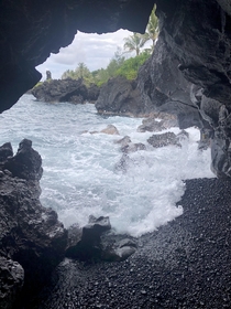 Pacific Ocean as seen from inside a lava tube on Maui HI 