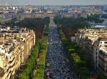 Paris France My visit in  atop the Arc de Triomphe looking down Champs Elysees to the Louvre during Magic Hour
