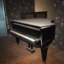 Piano left behind in an abandoned chateu