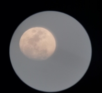 Picture of the Moon I took in   if you are confused It is a lot more clear than the last image I have taken and posted here I know it isnt perfect I literally pointed my phones camera to my telescopes lense 