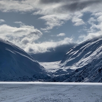 Portage Glacier beyond frozen Portage Lake Chugach National Forest Alaska  OC