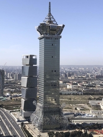 Possibly one of the weirdest towers in the world Just finished construction in Baku Azerbaijan