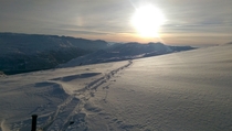 Preparing to ski down again Rldal Norway 