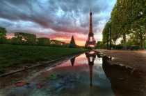 Puddle reflection of Eiffel Tower Paris France 