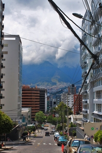 Quito Ecuador a cramped city reaching into the clouds of a volcano 