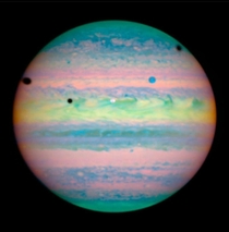 Rare triple eclipse on Jupiter Three of Jupiters moons -- Io Ganymede amp Callisto cast dark shadows onto the planet