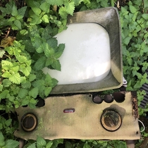 Recently explored an abandoned cottage amp farm Had to go through a lot of junk but there were a few gems left behind this vintage Murphy TV being one of them Link in comments for more 