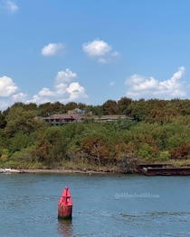 Remains of Riverside Hospital on North Brother Island - now uninhabited and a bird sanctuary - as seen from the East River Ferry The Bronx New York City