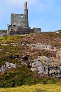 Remains of steam pump hall and chimney on the Beara peninsula Ireland 