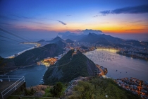 Rio de Janeiro at sunset from atop Sugarloaf Mountain  by Adhemar Duro