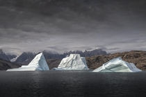 Sailing through the Bjorn OerBear Islands in Eastern Greenland we passed these three ancient pieces of ice on their long journey back into the sea 
