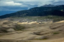 Sand dunes and mountains Great sand dunes Colorado 