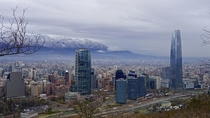 Santiago de Chile in winter next to the snowy Andes the mountains range that separates Chile from Argentina