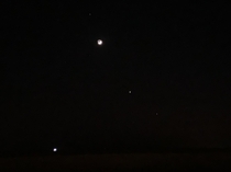 Saturn on the top and then the moon and venus and Jupiter at the bottom