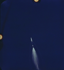 Saturn V Stage Separation During the Launch of Apollo  July th  The Image was Taken with a mm Camera Mounted on the Cargo Door of a US Air Force EC-N Aircraft The Rocket is  Miles Downrange at an Altitude of  Miles 