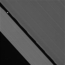 Saturns moon Daphnis orbiting in a rift in Saturns rings -- taken by NASAs Cassini 