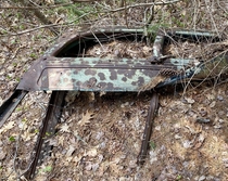 Section of a car  truck  Found on the grounds of a long gone water powered mill and sheep farm in Massachusetts