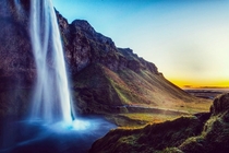 Seljalandsfoss Waterfall just before sunset My boyfriend photographer and I spent  days road tripping around Iceland   IG divingdrifters
