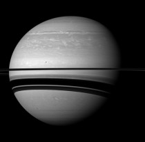 Serene Scene - Saturn and its moon Tethys 