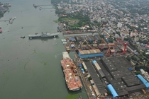 Shipyard at Kochi India featuring two aircraft carriers 