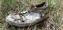 Shoe forgotten at abandoned summer camp