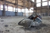 Shoe in abandoned factory 