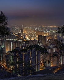 Shortly before sunrise the view over Kowloon from Lion Rock