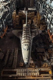 Shuttles left to rot in abandoned hanger in the middle of the desert in Kazakstan