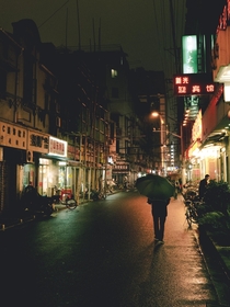 Side street on a rainy evening in Shanghai 