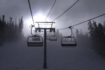 Ski chairlift taking you into the clouds Beaver Creek Colorado By Mabry Campbell 