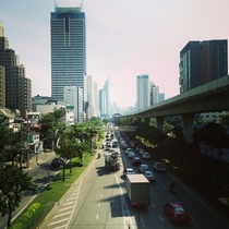 Sky train and main road leading to central Bangkok  OC