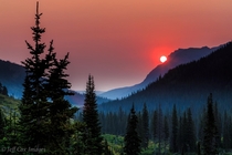 Smoky Mountain Sunrise at Upper Two Medicine Lake Photo by Jeff Cox 