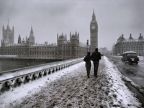 Snow falling upon Westminster Bridge and the Houses of Parliament London 