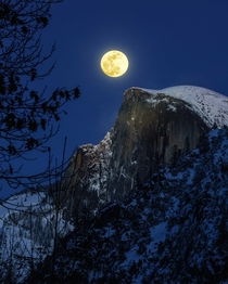 Snow Moon Rising over Half Dome in Yosemite National Park 