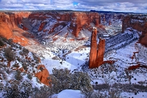 Snow on the red rocks of the Canyon de Chelly in the Navajo Nation Arizona  photo by Arnaud Lagandr
