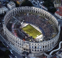 Soccer game played at the most ancient stadium in the world at Pula Arena in Croatia This is the only remaining Roman amphitheatre to have four side towers and with three Roman orders preserved It was constructed in  BC   AD and is among the worlds six la