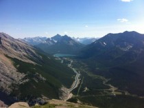 Spray Lakes Canal visibly entering Mount Lawrence Grassi from the top of Mount Rundle near Canmore Alberta 