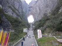 Stairs leading to Tianmen Shan Heavens Gate Mountain natural arch in Hunan province China 
