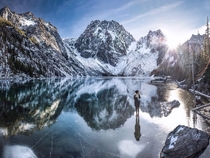 standing on frozen colchuck lake tannerwendell 