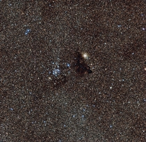 Star cluster NGC  and Barnard  a strangely dark gas cloud Zoom in and youre actually able to see countless individual stars Keep in mind each star is still light years apart from each other