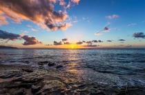 Staring Into The Sun - Sunset on Laniakea beach in Oahu Hawaii 