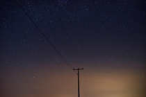 Stars behind a power line