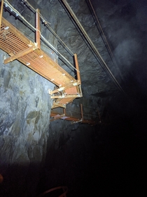Steel catwalk above a flooded underground chamber 