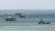 Stiltsville is Miamis  ocean houses on stilts none of which are inhabited Eventually hurricanes will tear them all down 