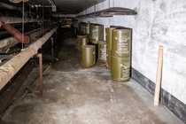 Strange green barrels found in the basement of an abandoned high school in Detroit OC x