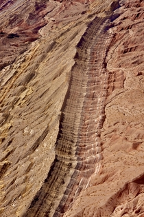 Strata exposed by erosion of folded rock - Helicopter shot from just outside Las Vegas OC - x