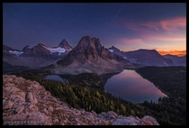 Sunburst Serenity - the final burst of light as the sun sets over Mount Assiniboine Provincial Park Canada  by Steve Dublanko