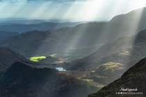 Sunrays over Blea Tarn from the Langdale Pikes The Lake District 